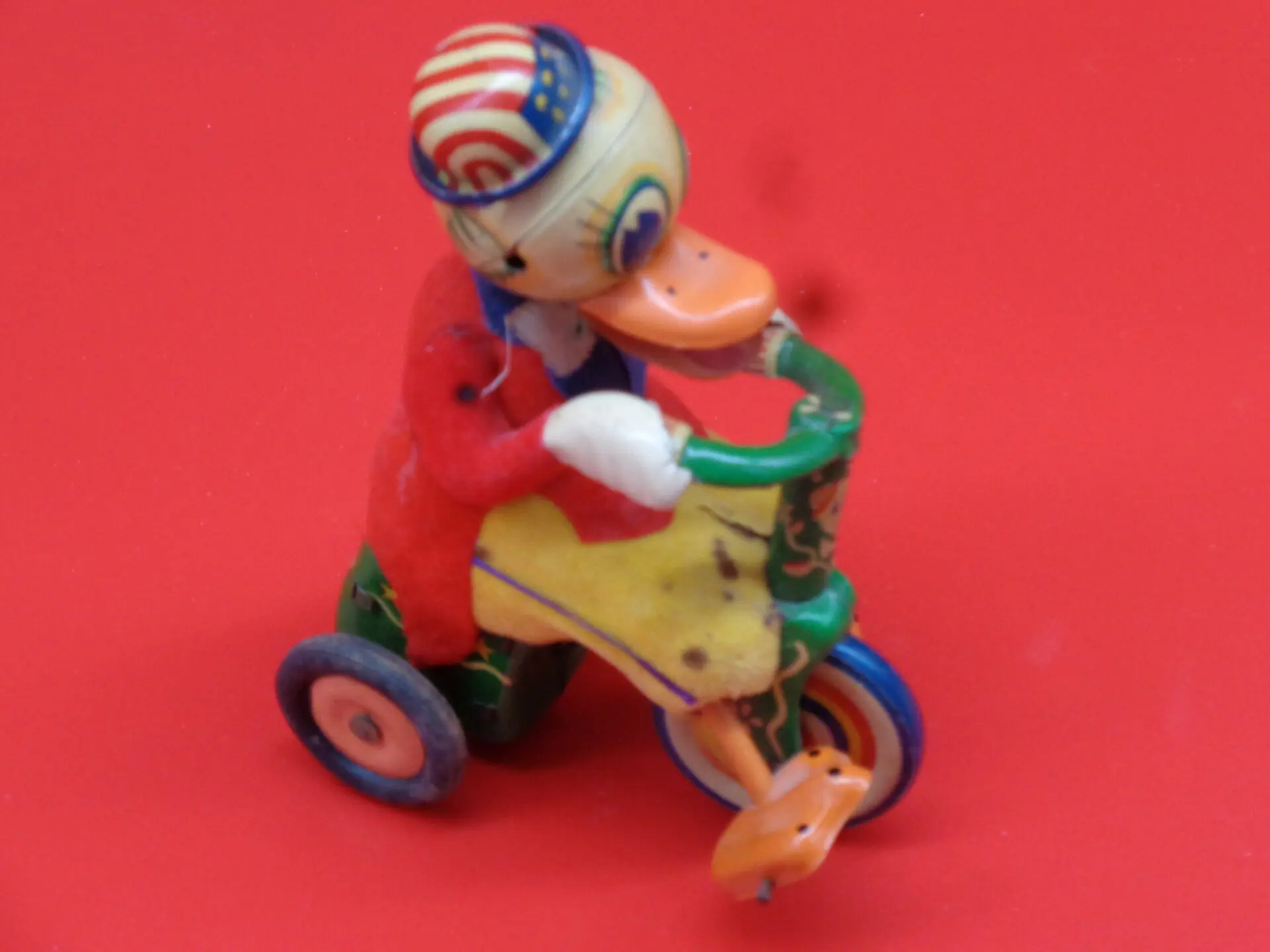 Vintage duck-on-a-bike toy
