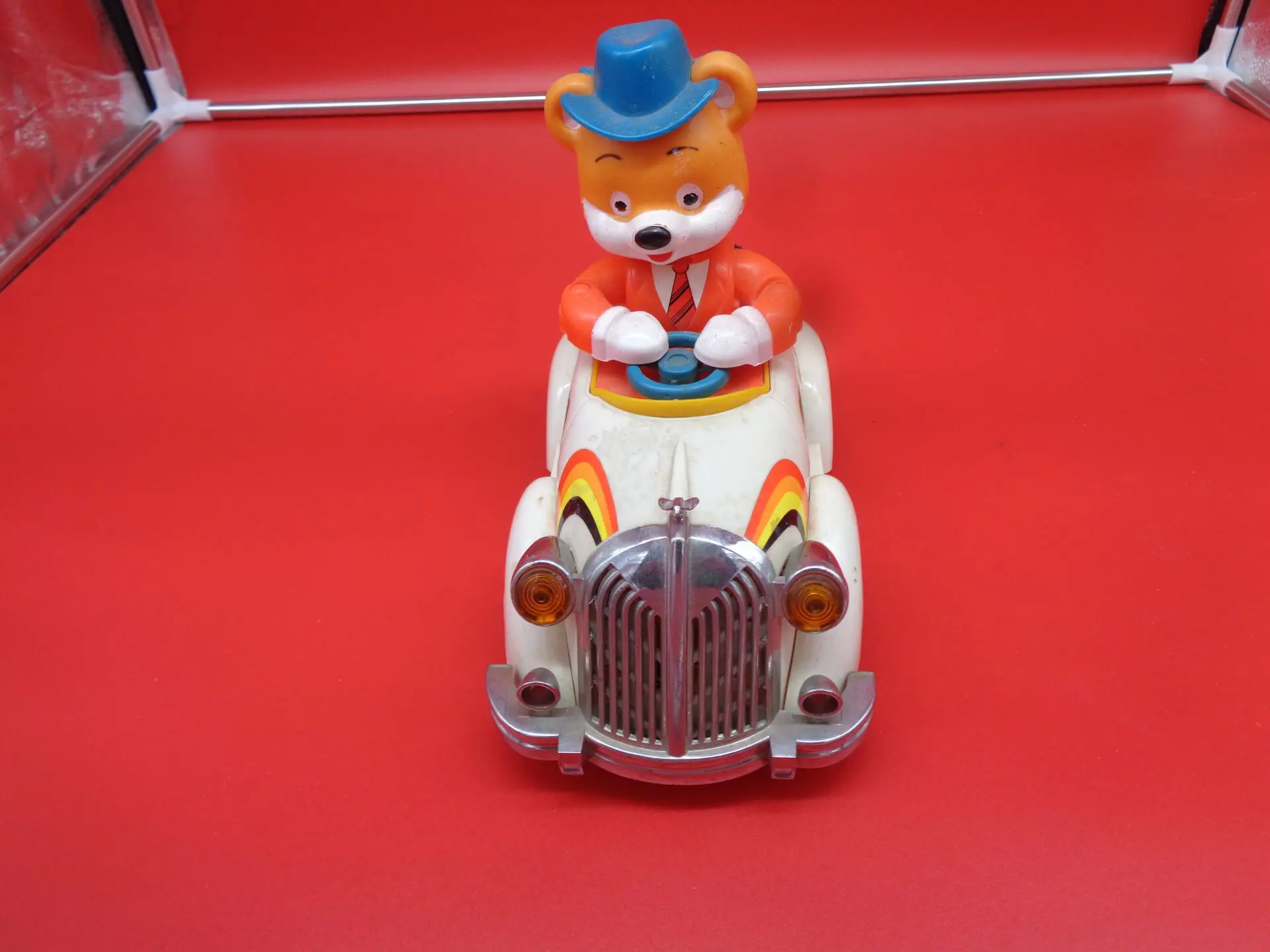 Vintage toy car with a fox