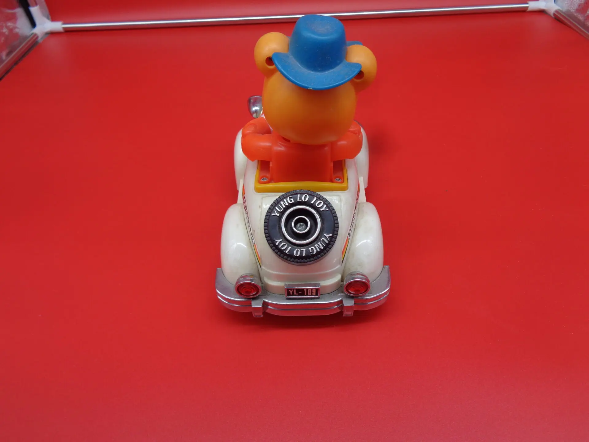 Vintage toy car with a fox