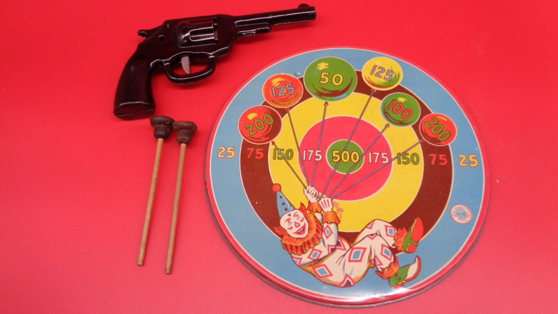 Gun darts game