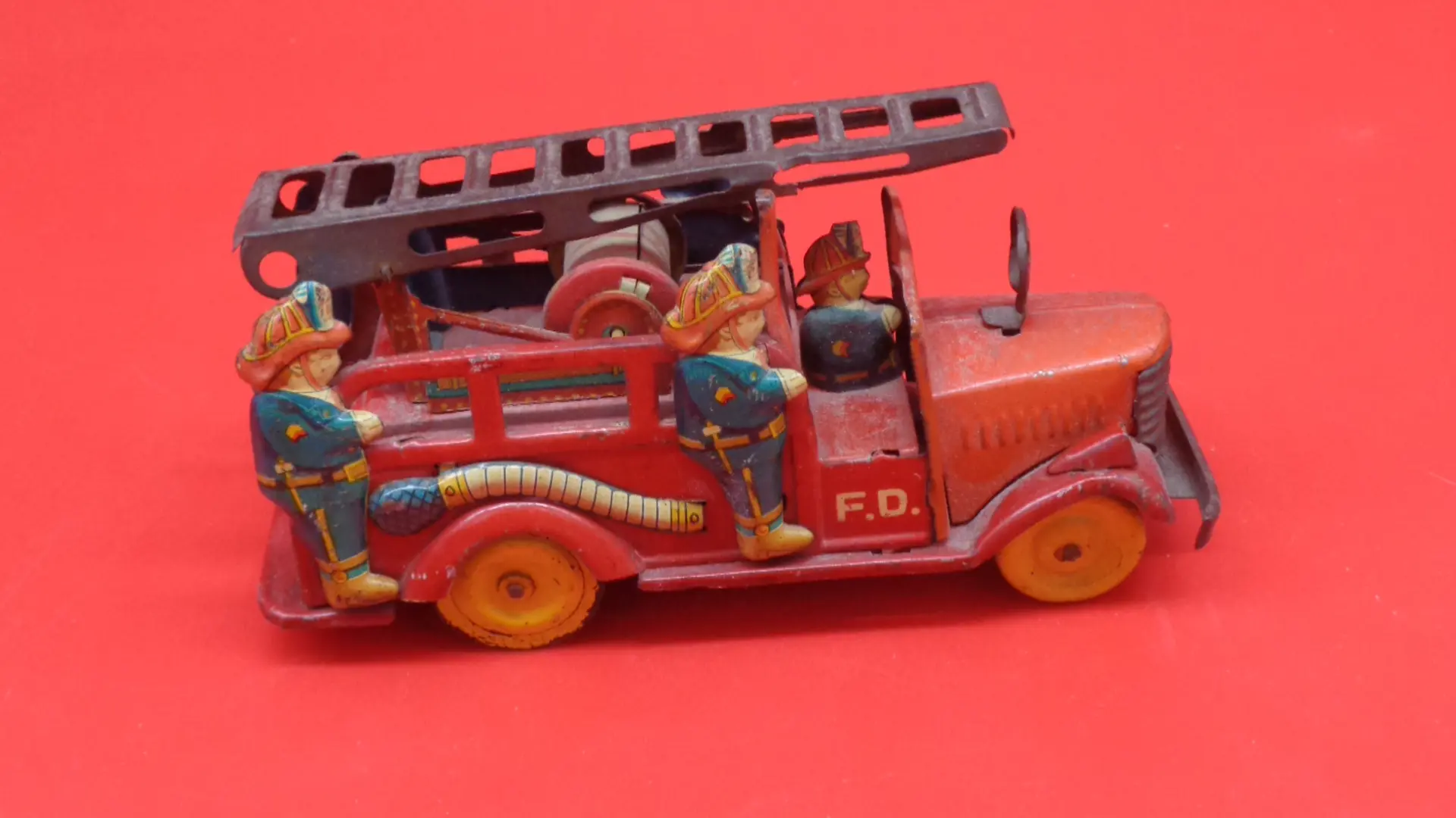 Small, vintage toy firetruck