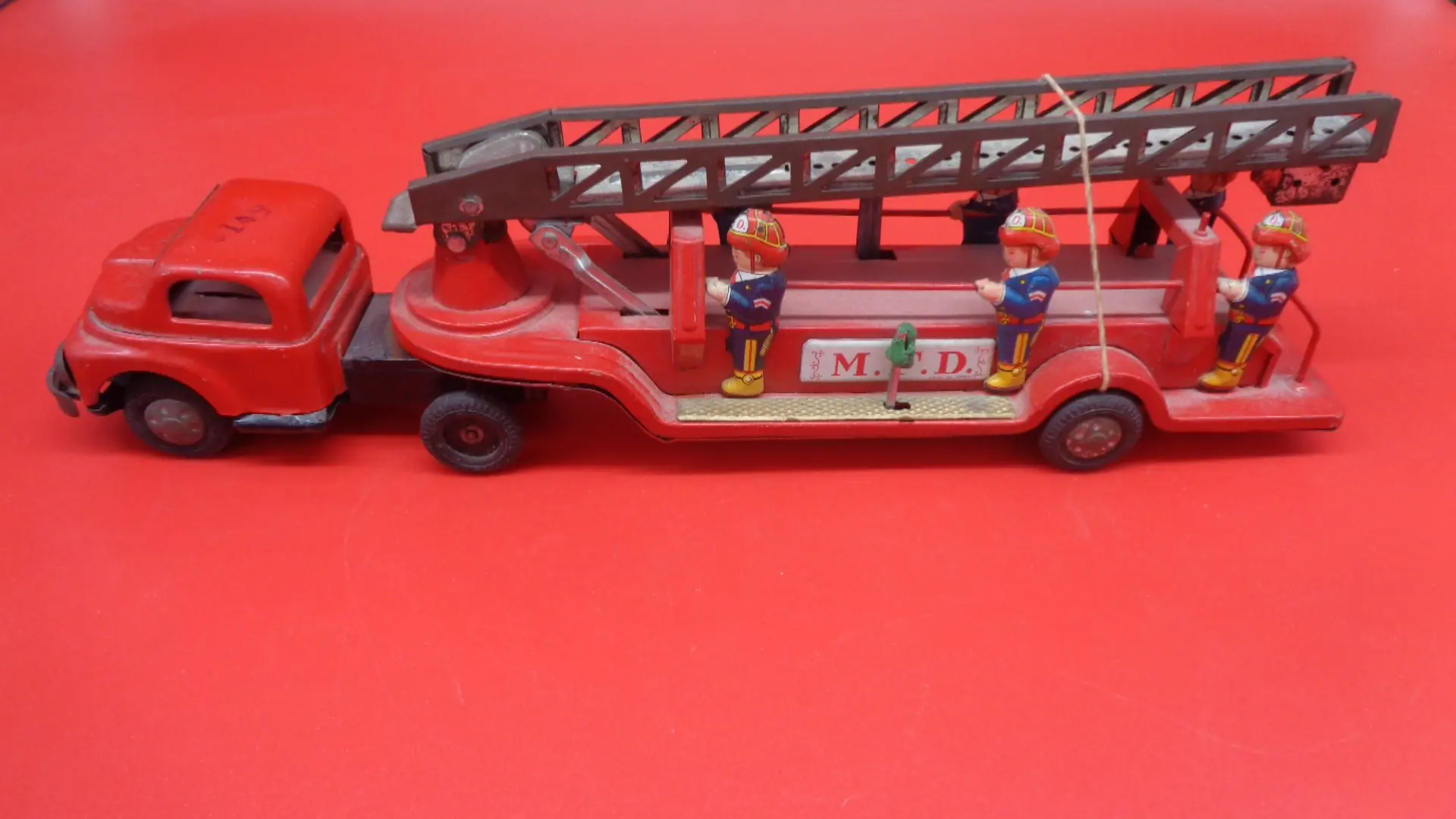Long, vintage toy firetruck