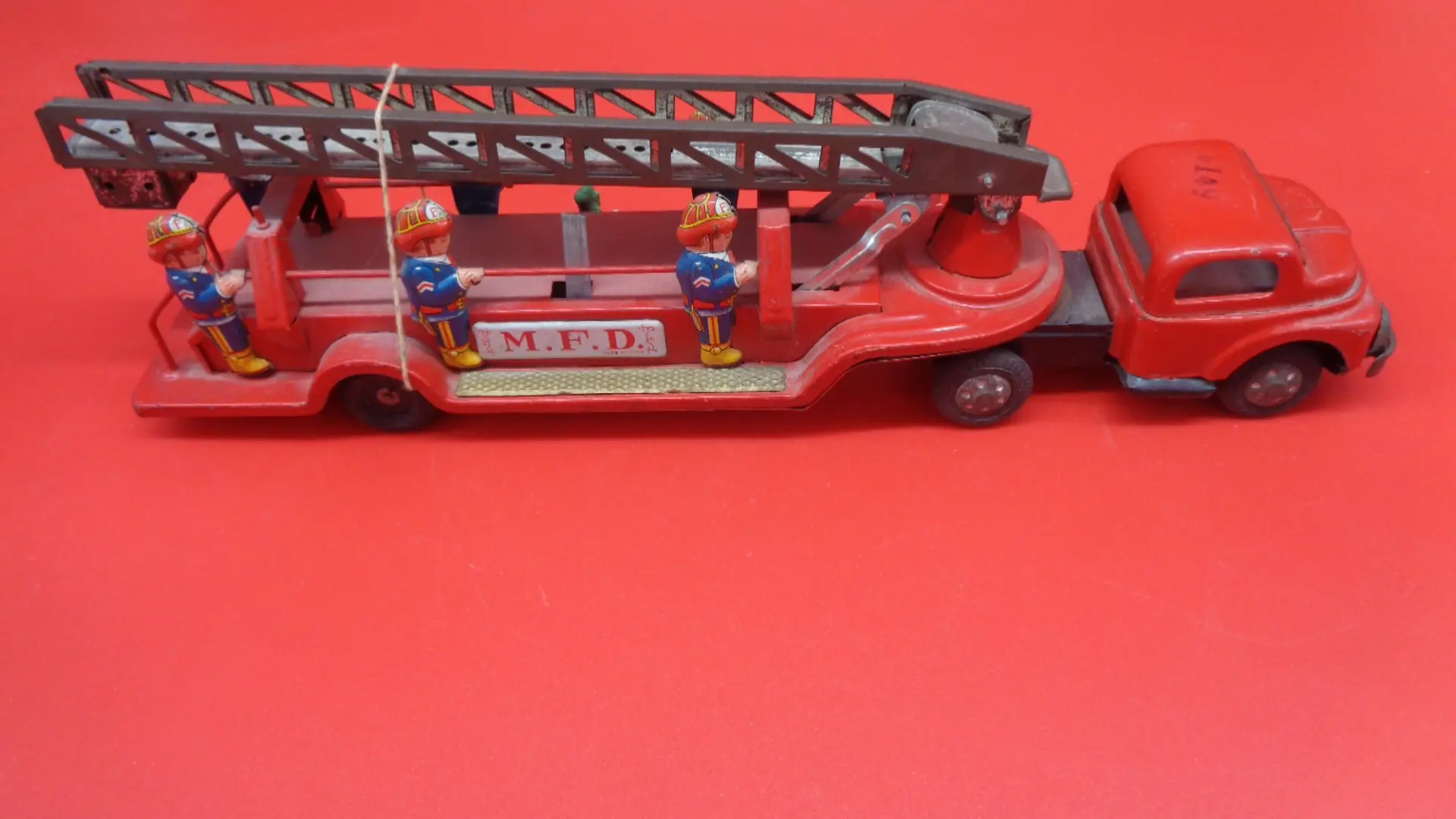 Long, vintage toy firetruck