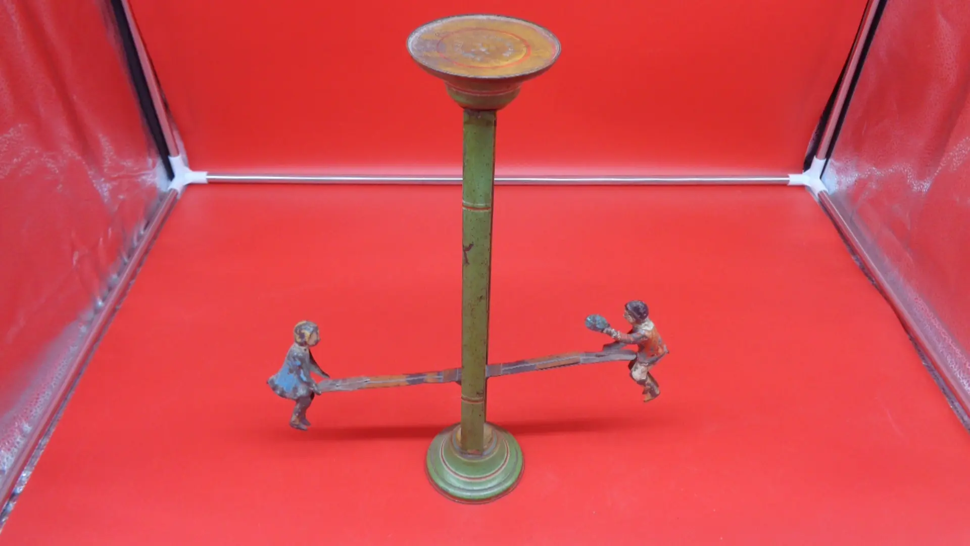 Tall, vintage see-saw toy