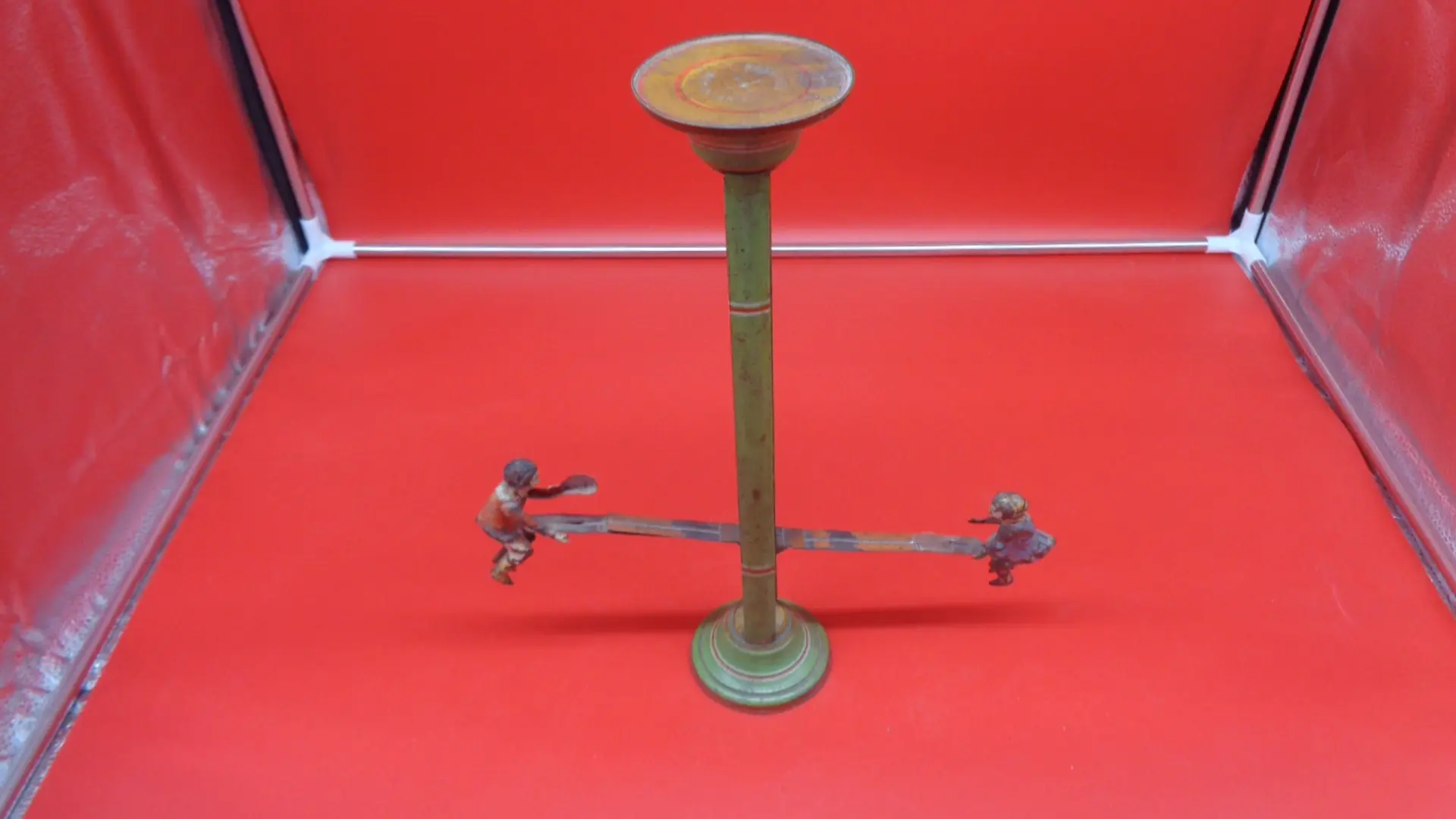 Tall, vintage see-saw toy