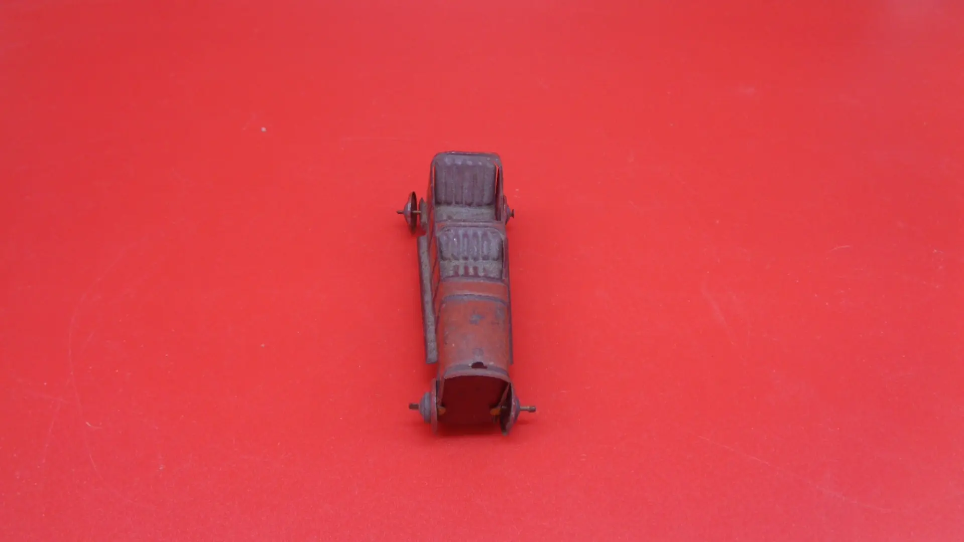 Miniature, vintage roofless toy car