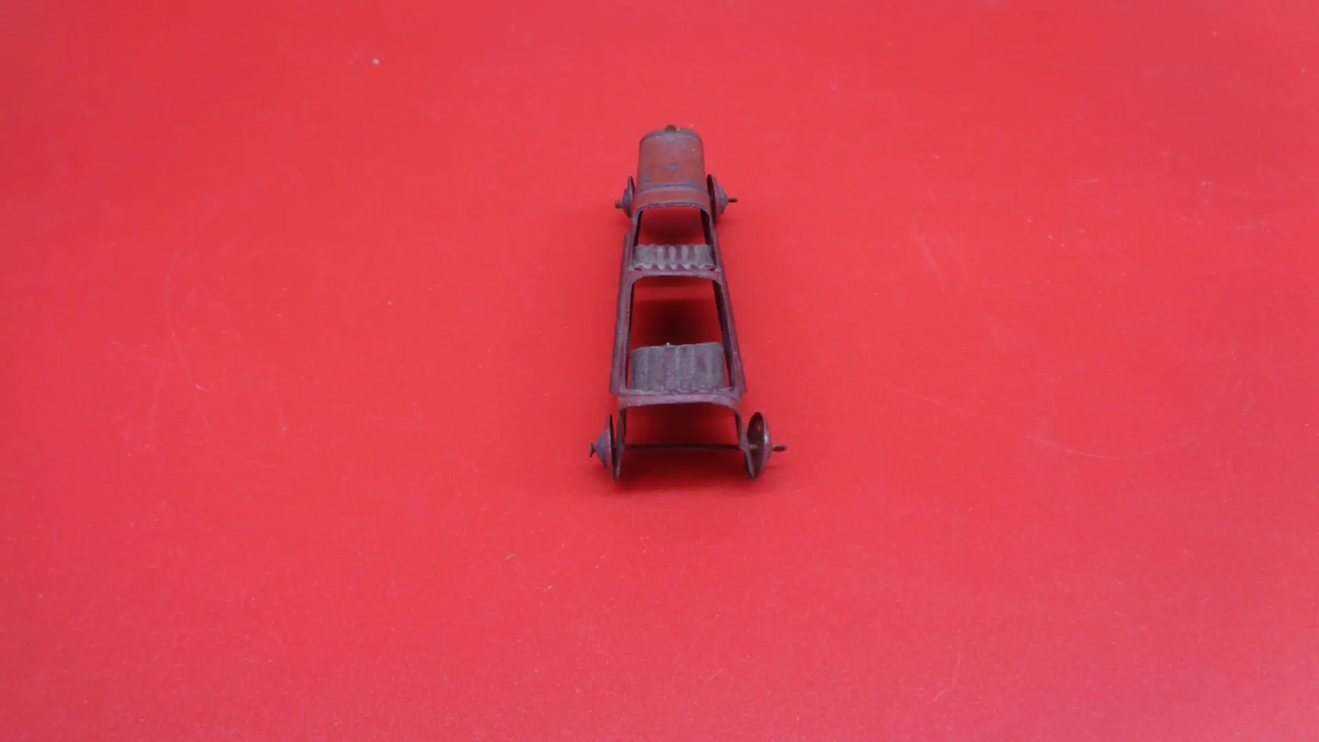 Miniature, vintage roofless toy car