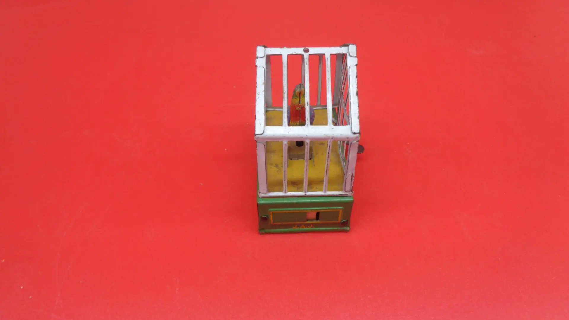 Bird on a cage wind-up toy