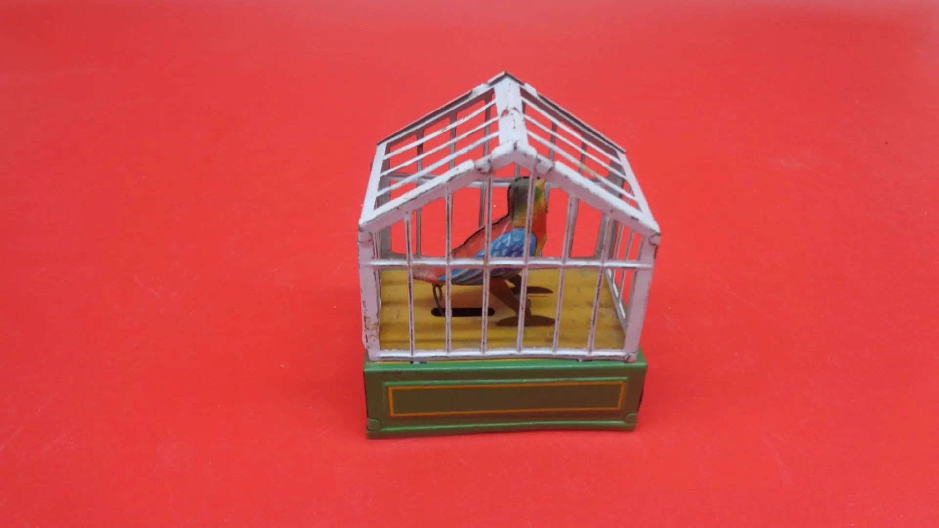 Bird on a cage wind-up toy