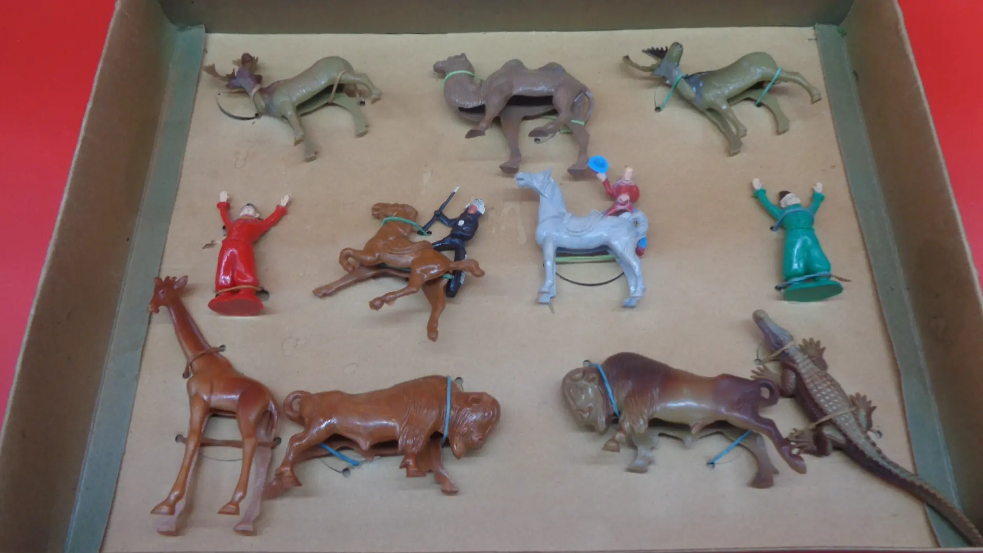 Plastic figures of people and animal