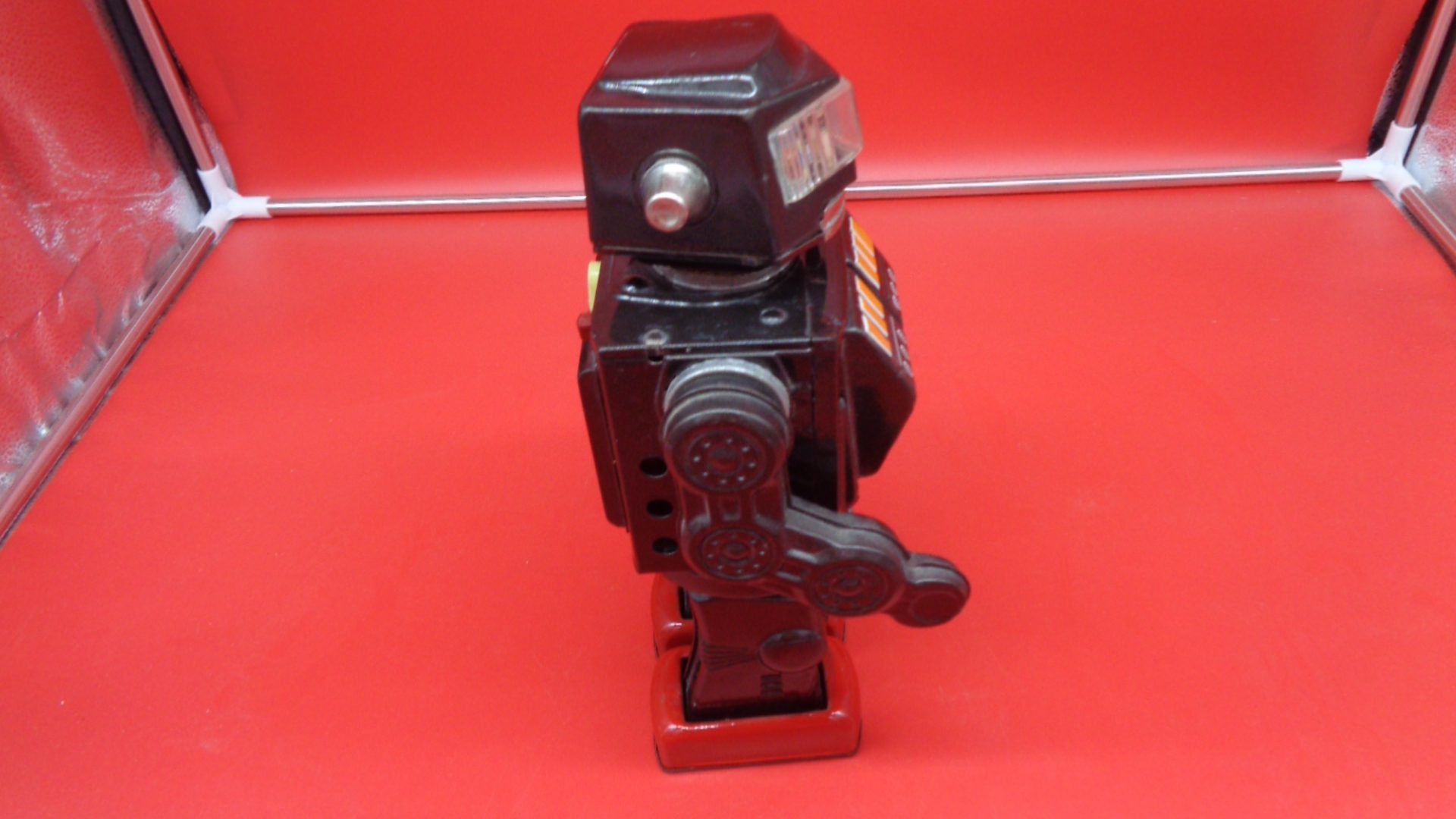 Black toy robot, right view