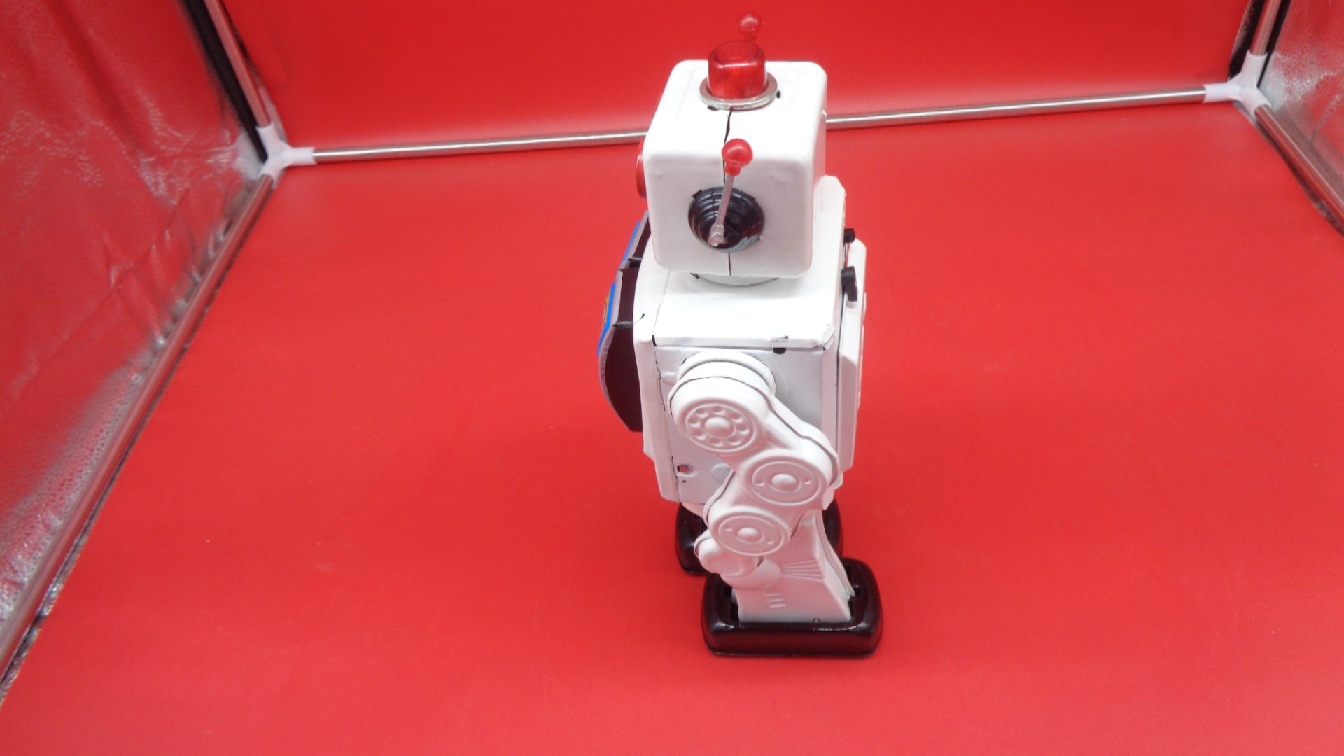 White toy robot, left view