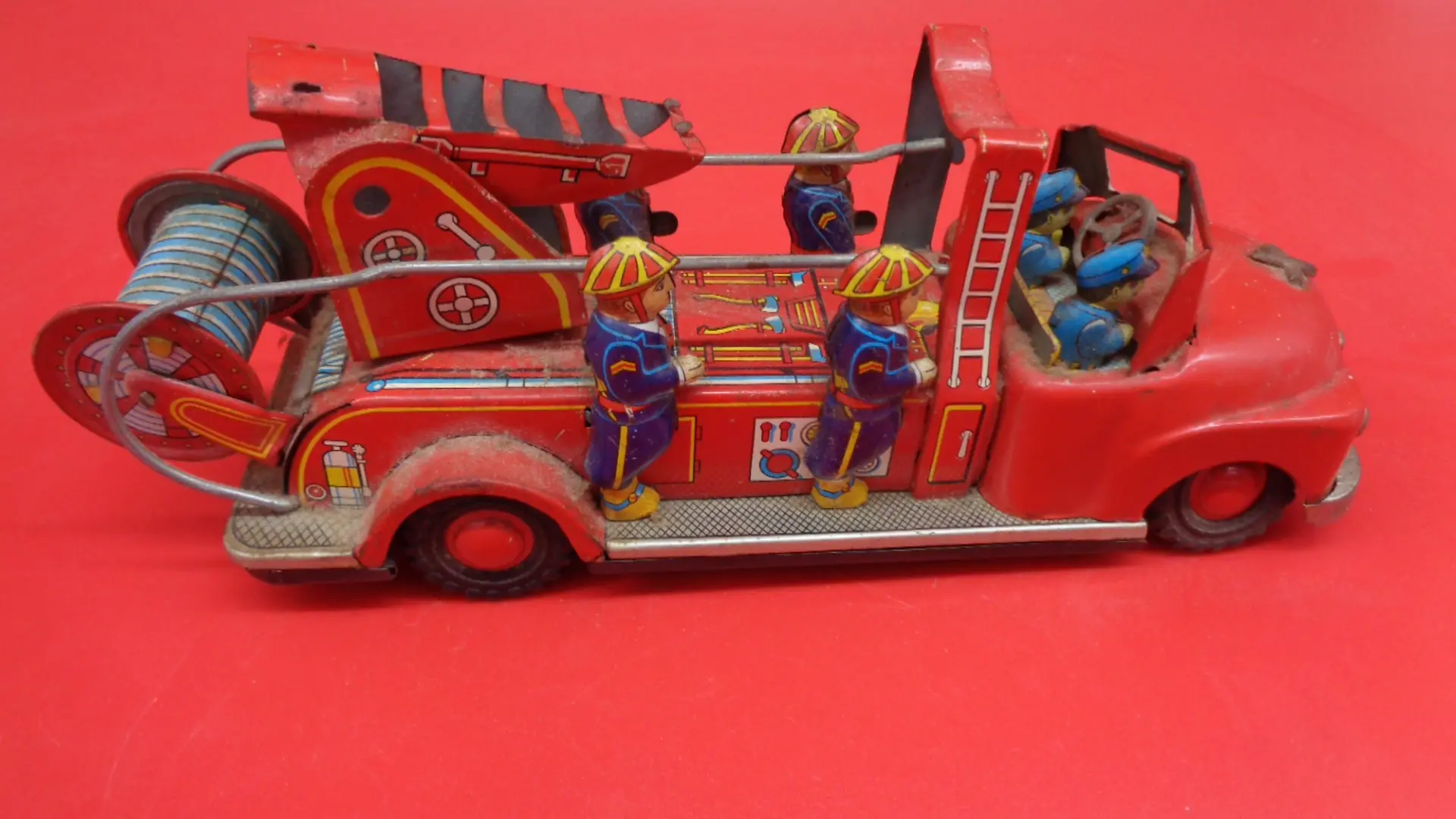 Left side view of Japan 6 Man Ladder Fire Truck Toy