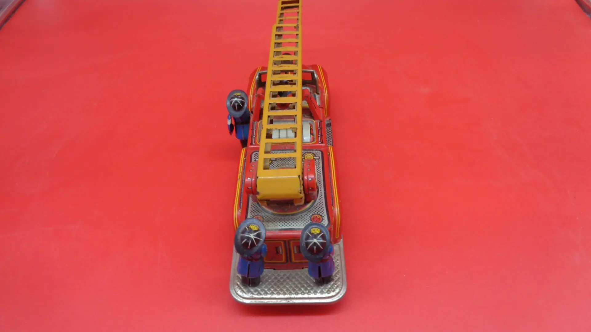 Top view of Vintage SSS Ladder Fire Truck Tin Litho