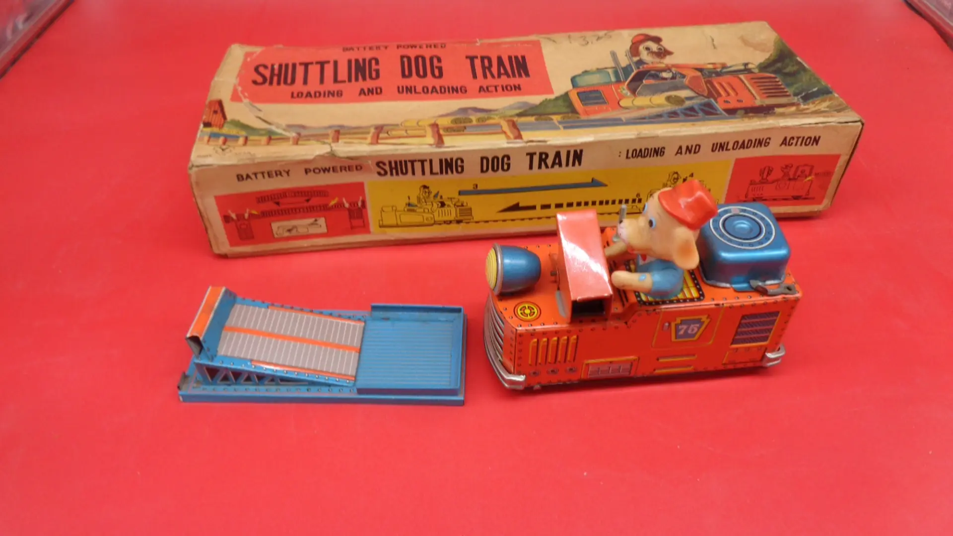 Vintage 76 no Shuttling dog train play set with box, track.