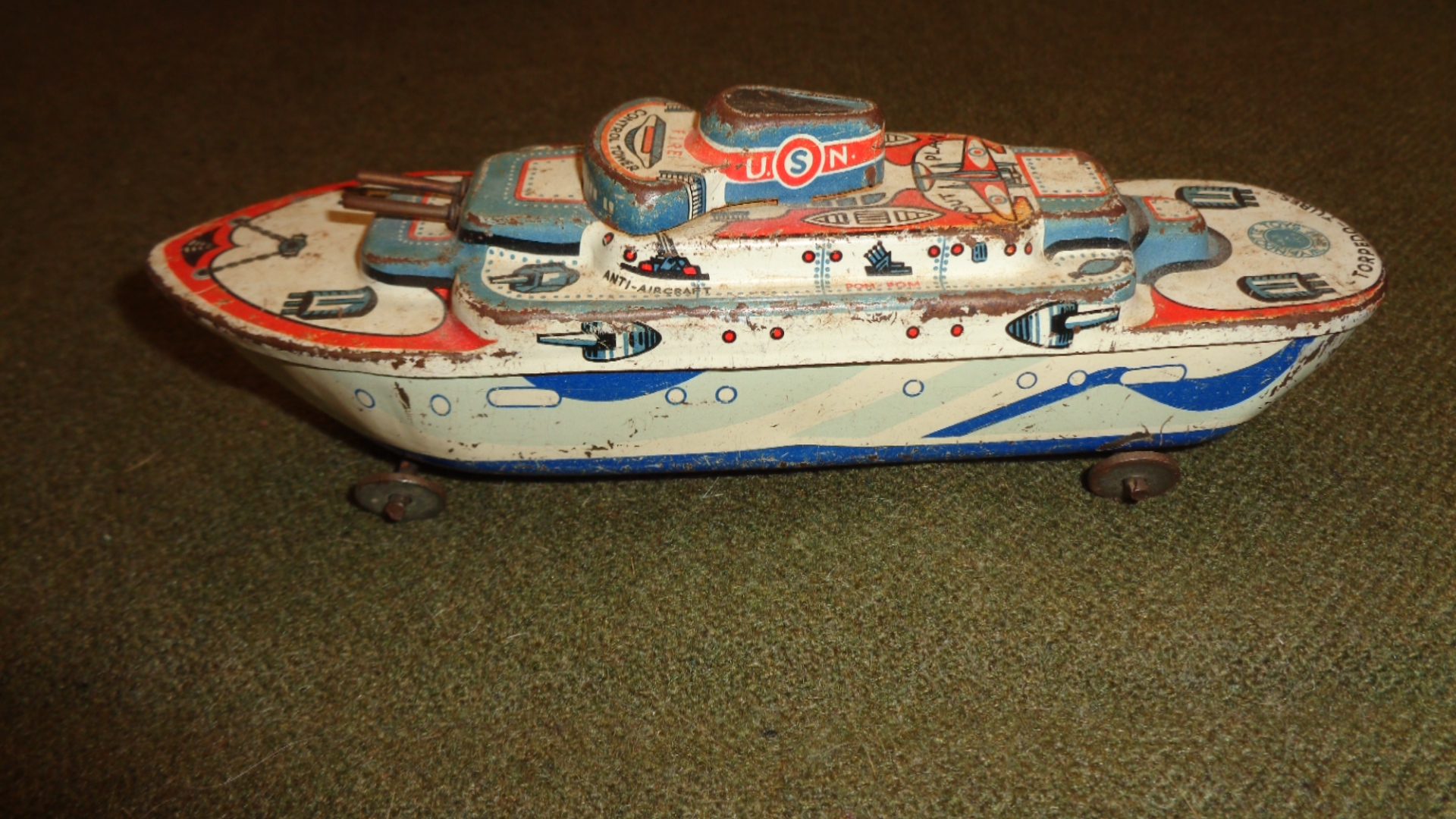 Wyandotte Toys USA, Vintage Tin Litho on Wheels USN Ship, Left View